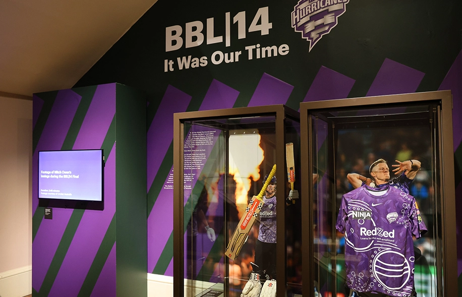 BBL Hurricanes jersey, cricket bat and gloves in a glass display